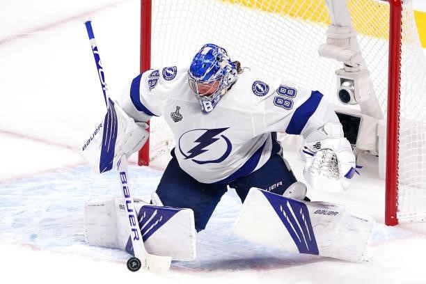 Andrei Vasilevskiy of the Tampa Bay Lightning blocks a shot against the Montreal Canadiens during the second period in Game Three of the 2021 NHL...