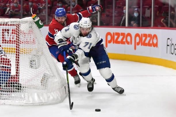 Anthony Cirelli of the Tampa Bay Lightning is defended by Ben Chiarot of the Montreal Canadiens during the second period in Game Three of the 2021...