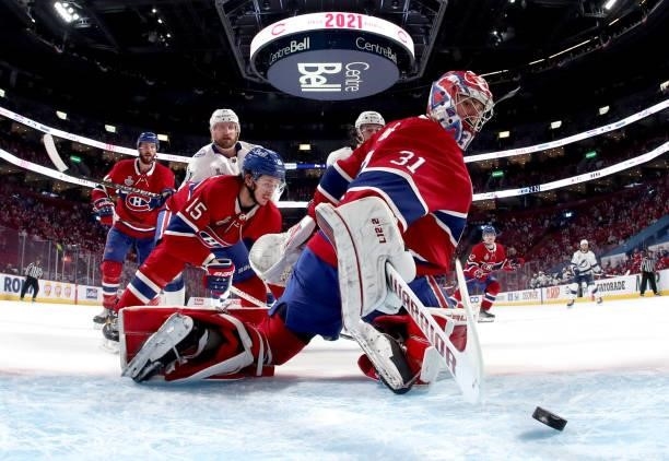 Goaltender Carey Price of the Montreal Canadiens makes a save while playing against the Tampa Bay Lightning during the first period of Game Three of...