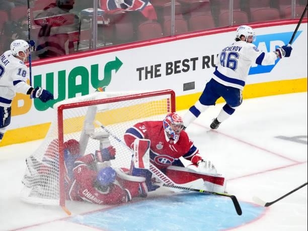 Nikita Kucherov of the Tampa Bay Lightning scores a goal past Carey Price of the Montreal Canadiens during the second period in Game Three of the...
