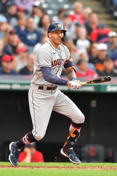 Carlos Correa of the Houston Astros hits an RBI double during the third inning against the Cleveland Indians at Progressive Field on July 02, 2021 in...