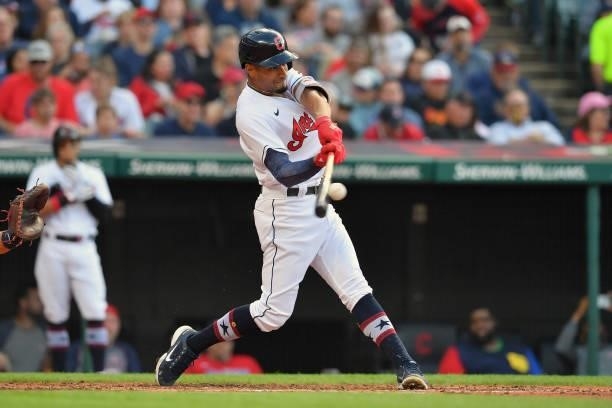 Oscar Mercado of the Cleveland Indians hits a triple during the second inning against the Houston Astros at Progressive Field on July 02, 2021 in...