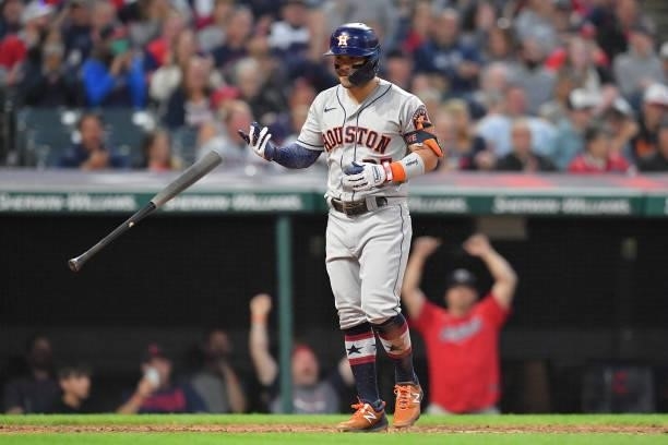 Jose Altuve of the Houston Astros reacts after striking out to end the top of the sixth inning against the Cleveland Indians at Progressive Field on...