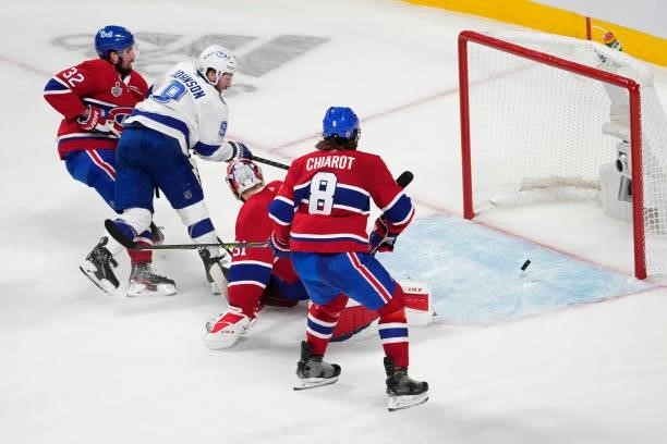 Tyler Johnson of the Tampa Bay Lightning scores a goal past Carey Price of the Montreal Canadiens during the third period in Game Three of the 2021...