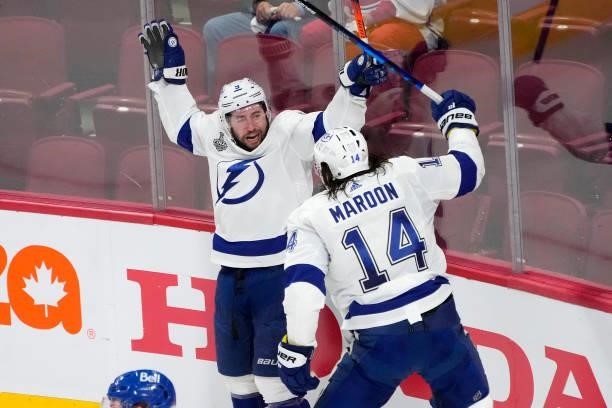 Tyler Johnson of the Tampa Bay Lightning celebrates with Pat Maroon after scoring against Carey Price of the Montreal Canadiens during the third...