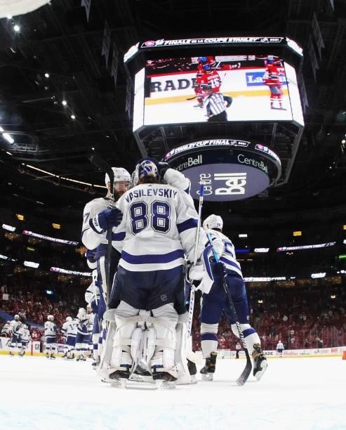 The Tampa Bay Lightning celebrate a 6-3 victory over the Montreal Canadiens during Game Three of the 2021 NHL Stanley Cup Final at the Bell Centre on...