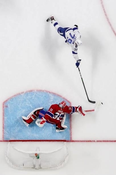 Carey Price of the Montreal Canadiens makes the save against Ross Colton of the Tampa Bay Lightning during the third period in Game Three of the 2021...