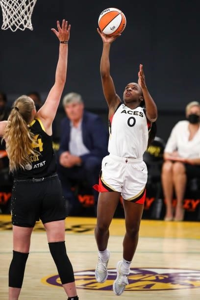 Guard Jackie Young of the Las Vegas Aces shoots over Lauren Cox of the Los Angeles Sparks in the first half at Los Angeles Convention Center on July...