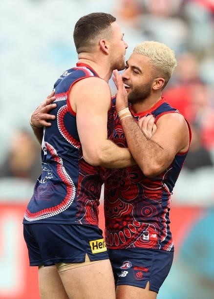 Christian Salem of the Demons celebrates after scoring a goal during the round 16 AFL match between Melbourne Demons and Greater Western Sydney...