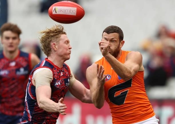 Sam J. Reid of the Giants handballs during the round 16 AFL match between Melbourne Demons and Greater Western Sydney Giants at Melbourne Cricket...