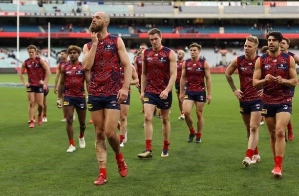 The Demons walk off after they were defeated by the Giants during the round 16 AFL match between Melbourne Demons and Greater Western Sydney Giants...