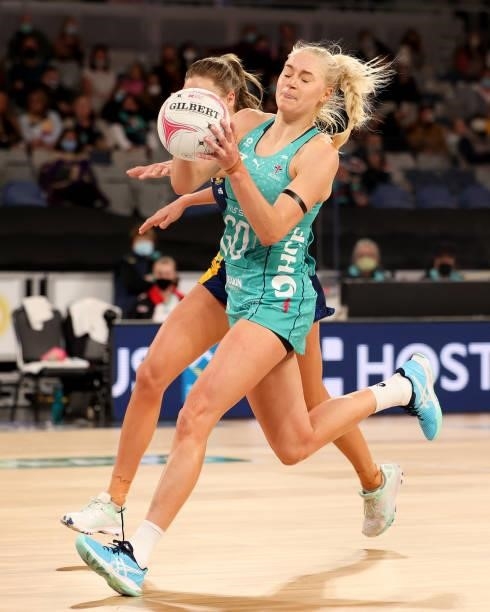 Jo Westen of the Vixens and Cara Koenen of the Lightning contest for the ball during the round nine Super Netball match between Sunshine Coast...