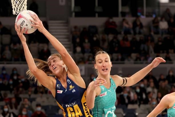 Cara Koenen of the Lightning and Emily Mannix of the Vixens contest for the ball during the round nine Super Netball match between Sunshine Coast...