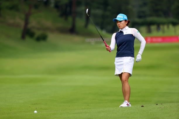 Chie Arimura of Japan is seen before her second shot on the 18th hole during the first round of the Shiseido Ladies Open at Totsuka Country Club on...