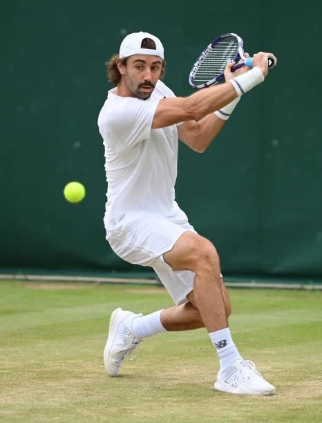 Jordan Thompson of Australia plays a backhand during his men's singles third round match against Ilya Ivashka of Belarus during Day Six of The...