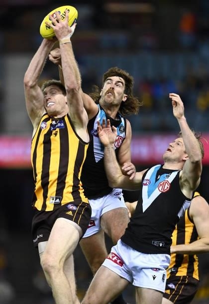 Ben McEvoy of the Hawks marks infront of Scott Lycett of the Power during the round 16 AFL match between Hawthorn Hawks and Port Adelaide Power at...