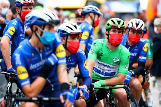 Mark Cavendish of The United Kingdom and Team Deceuninck - Quick-Step Green Points Jersey and Teammates at start during the 108th Tour de France...