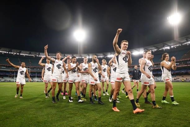 Patrick Cripps of the Blues leads the Blues off the ground after winning the round 16 AFL match between Fremantle Dockers and Carlton Blues at...