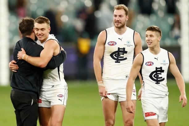 David Teague, senior coach of Carlton and captain Patrick Cripps embrace after the round 16 AFL match between Fremantle Dockers and Carlton Blues at...