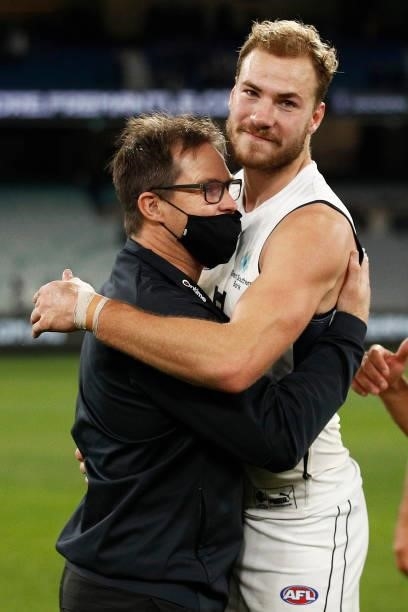 Blues head coach David Teague hugs Harry McKay of the Blues after winning the round 16 AFL match between Fremantle Dockers and Carlton Blues at...