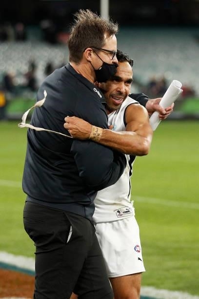 Blues head coach David Teague hugs Eddie Betts of the Blues after winning the round 16 AFL match between Fremantle Dockers and Carlton Blues at...