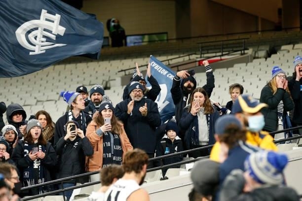 Carlton fans cheer their team after the round 16 AFL match between Fremantle Dockers and Carlton Blues at the Melbourne Cricket Ground on July 03,...