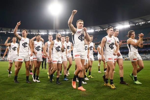 Patrick Cripps of the Blues leads the Blues off the ground after winning the round 16 AFL match between Fremantle Dockers and Carlton Blues at...