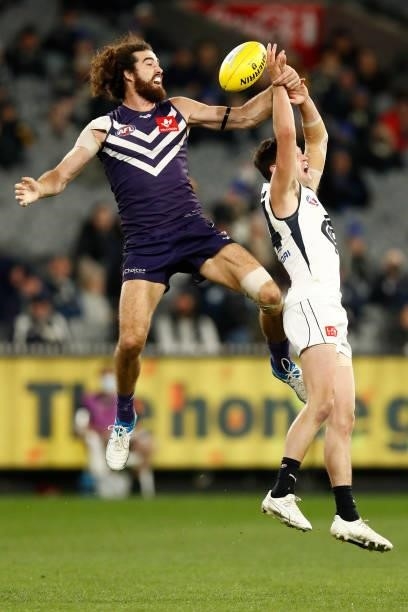 Alex Pearce of the Dockers spoils Nic Newman of the Blues during the round 16 AFL match between Fremantle Dockers and Carlton Blues at the Melbourne...