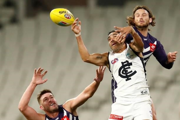 James Aish of the Dockers spoils Eddie Betts of the Blues during the round 16 AFL match between Fremantle Dockers and Carlton Blues at the Melbourne...
