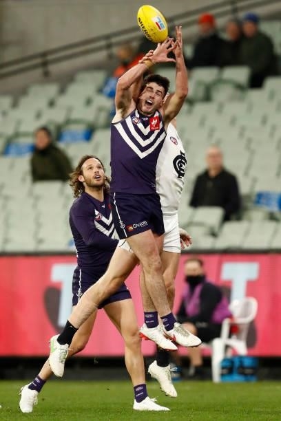 Tom De Koning of the Blues spoils Andrew Brayshaw of the Dockers during the round 16 AFL match between Fremantle Dockers and Carlton Blues at the...