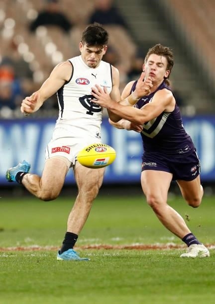 Matthew Kennedy of the Blues kicks the ball during the round 16 AFL match between Fremantle Dockers and Carlton Blues at the Melbourne Cricket Ground...