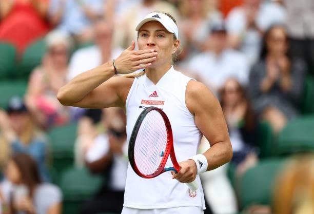 Angelique Kerber of Germany celebrates after victory in her Ladies' Singles third Round match against Aliaksandra Sasnovich of Belarus during Day Six...
