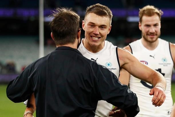 Blues head coach David Teague hugs Patrick Cripps of the Blues after winning the round 16 AFL match between Fremantle Dockers and Carlton Blues at...