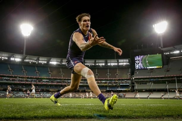 Rory Lobb of the Dockers chase the ball as it goes out of bounds during the round 16 AFL match between Fremantle Dockers and Carlton Blues at the...
