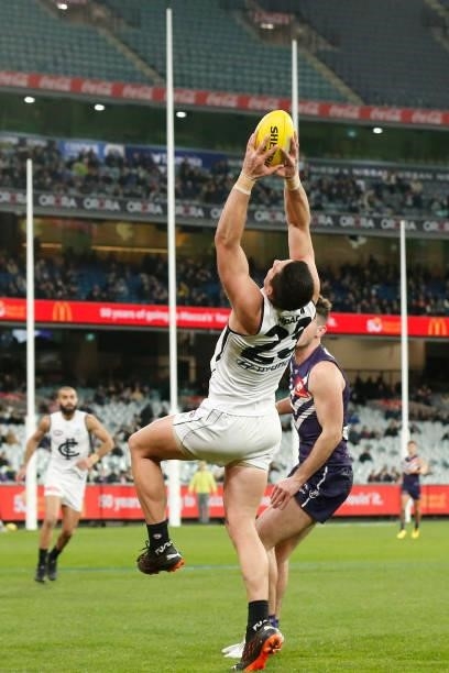 Jacob Weitering of the Blues marks the ball during the round 16 AFL match between Fremantle Dockers and Carlton Blues at the Melbourne Cricket Ground...