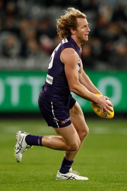 David Mundy of the Dockers runs with the ball during the round 16 AFL match between Fremantle Dockers and Carlton Blues at the Melbourne Cricket...
