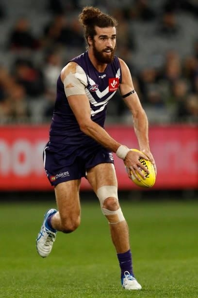 Alex Pearce of the Dockers runs with the ball during the round 16 AFL match between Fremantle Dockers and Carlton Blues at the Melbourne Cricket...