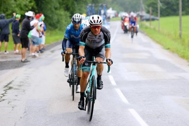 Alejandro Valverde of Spain and Movistar Team & Christopher Juul-Jensen of Denmark and Team BikeExchange during the 108th Tour de France 2021, Stage...
