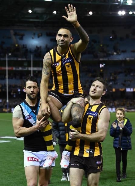 Shaun Burgoyne of the Hawks is chaired off in game 400 during the round 16 AFL match between Hawthorn Hawks and Port Adelaide Power at Marvel Stadium...
