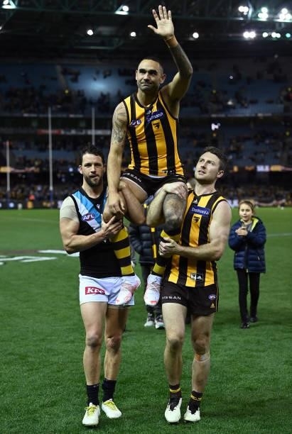 Shaun Burgoyne of the Hawks is chaired off in game 400 during the round 16 AFL match between Hawthorn Hawks and Port Adelaide Power at Marvel Stadium...
