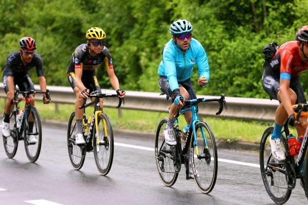 Sepp Kuss of The United States and Team Jumbo-Visma & Ion Izagirre of Spain and Team Astana - Premier Tech during the 108th Tour de France 2021,...