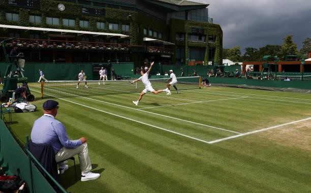 Rajeev Ram of United States and Joe Salisbury of Great Britain in action during their men's doubles second round match against Marton Fucsovics of...