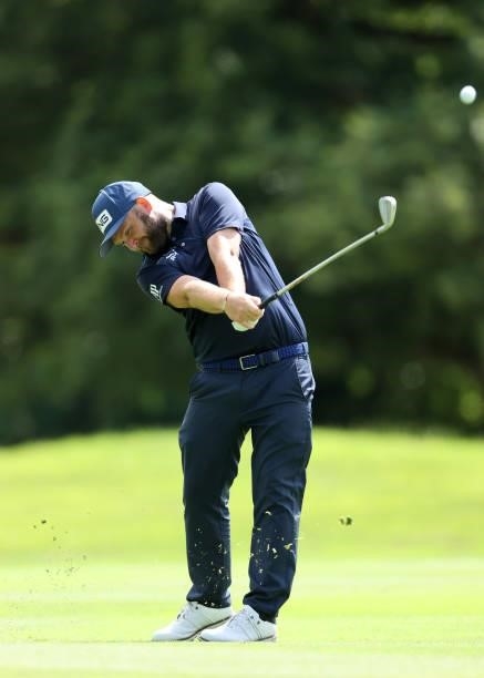 Andy Sullivan of England plays his second shot on the 10th hole during Day Three of The Dubai Duty Free Irish Open at Mount Juliet Golf Club on July...