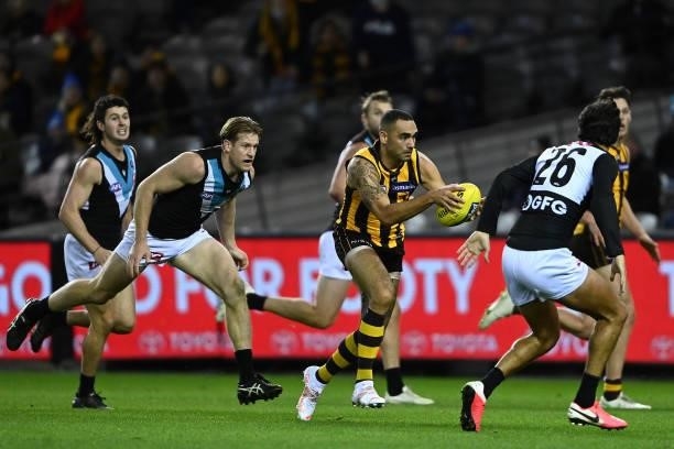 Shaun Burgoyne of the Hawks has a shot for goal during the round 16 AFL match between Hawthorn Hawks and Port Adelaide Power at Marvel Stadium on...
