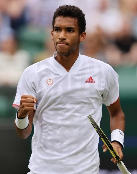 Felix Auger Aliassime of Canada celebrates a point during his men's singles third round match against Nick Kyrgios of Australia during Day Six of The...