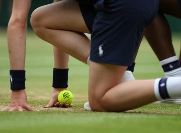 Detailed view a match ball and ball boy during Day Six of The Championships - Wimbledon 2021 at All England Lawn Tennis and Croquet Club on July 03,...