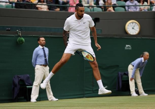Nick Kyrgios of Australia plays a shot through his legs during his men's singles third round match against Felix Auger Aliassime of Canada during Day...