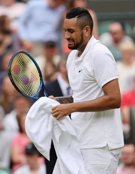 Nick Kyrgios of Australia reacts as he retire's injured during his men's singles third round match against Felix Auger Aliassime of Canada during Day...