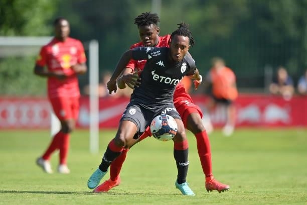 Gelson Batalha Martins of AS Monaco and Daouda Guindo of FC Red Bull Salzburg compete for the ball during the Pre-Season Friendly match between FC...