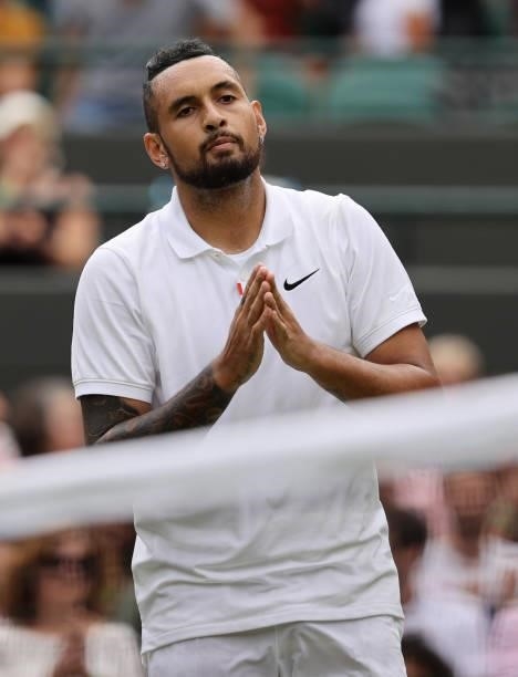 Nick Kyrgios of Australia interacts with the crowd after retiring injured during his men's singles third round match against Felix Auger Aliassime of...